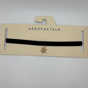 Aeropostale Black Choker with Gold Snowflake Charm